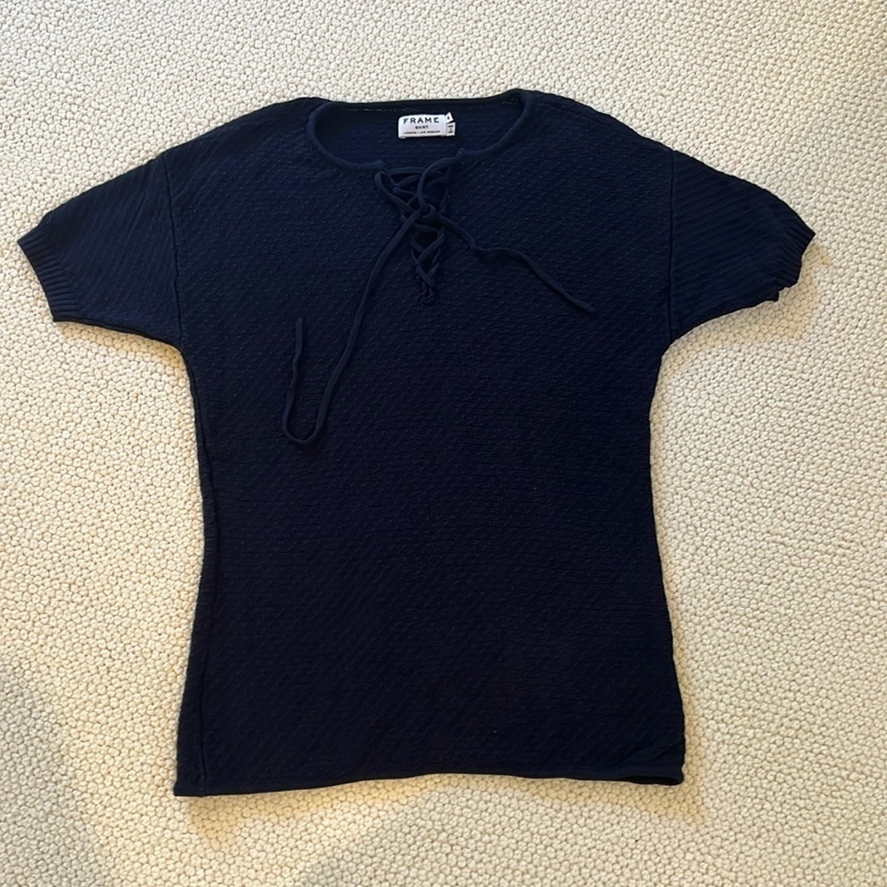 Frame knit lace up top